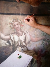restoring the fresco painting